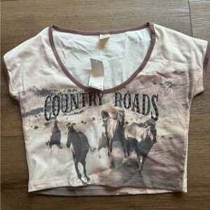 Size large, baby tee, with tags